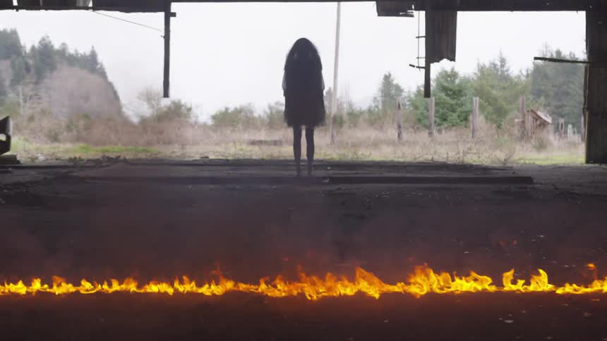 A person is looking at a fire