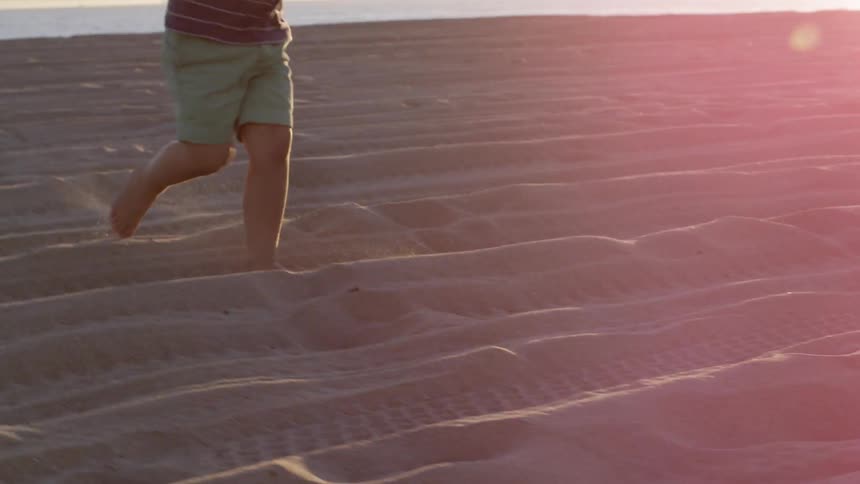 Little Boy On The Beach