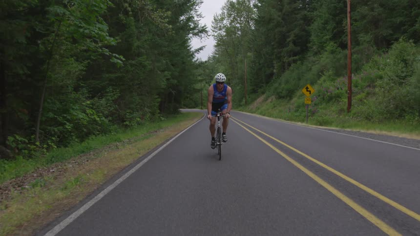 Man Cycling Outdoors