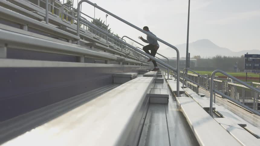 Man Exercising At Stadium
