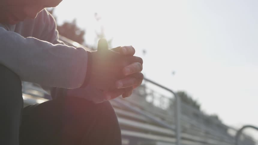 Man Exercising At Stadium