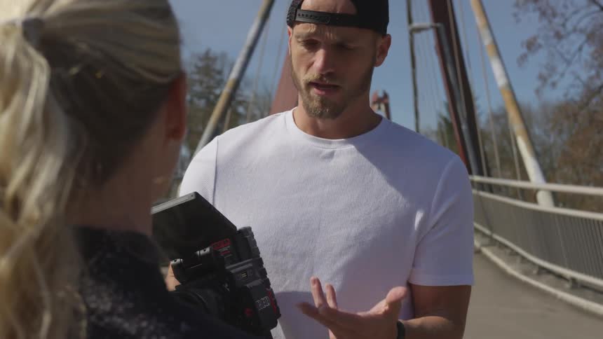 Man Filming Actors