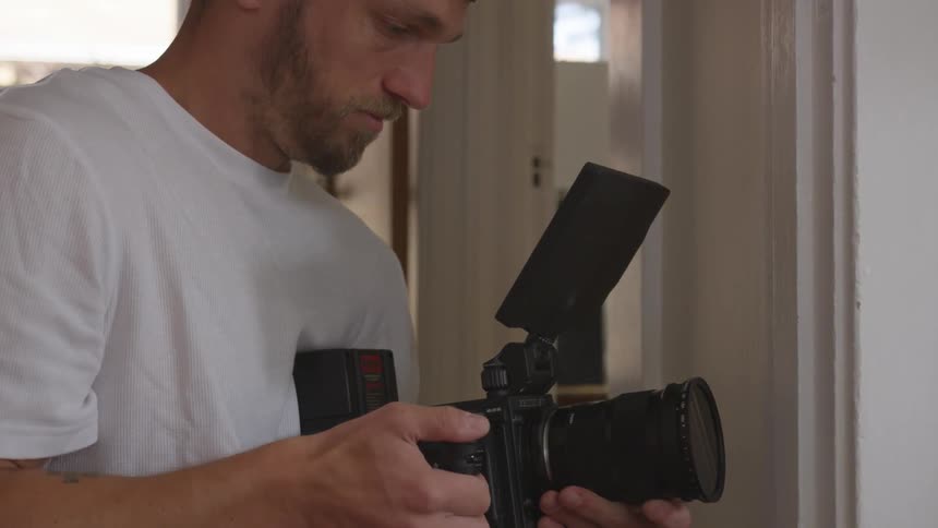 Man Filming Actors