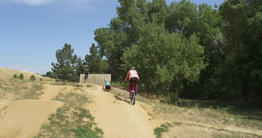 Bmx Riders On Dirt Track