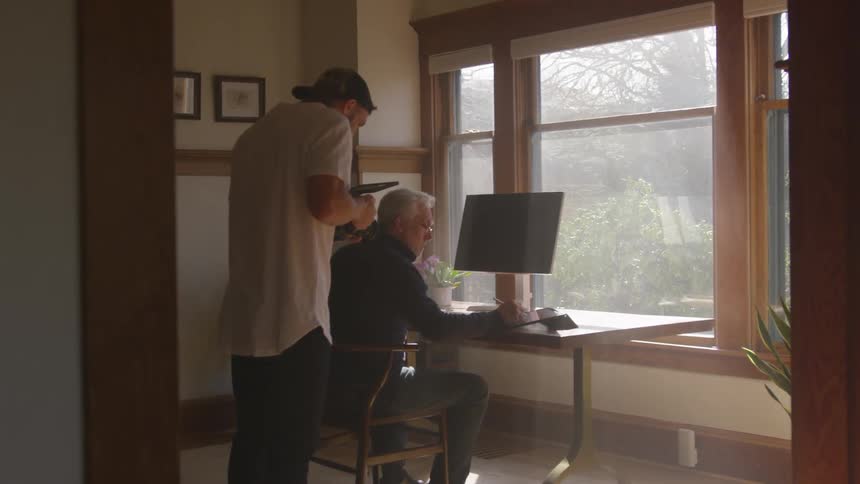 Man Filming Actors