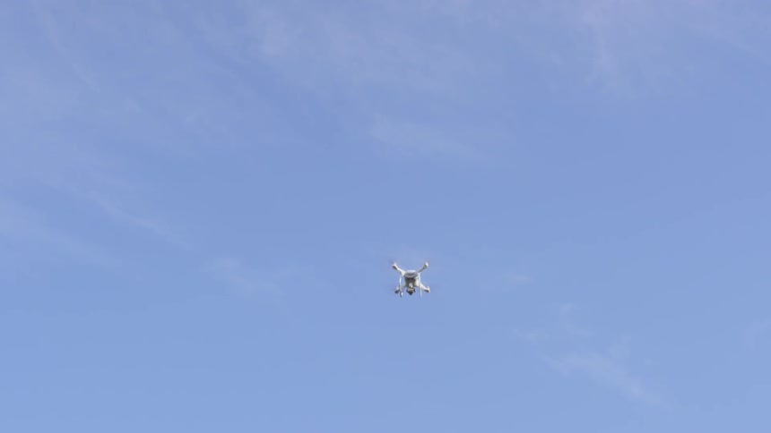 A drone flying in the air