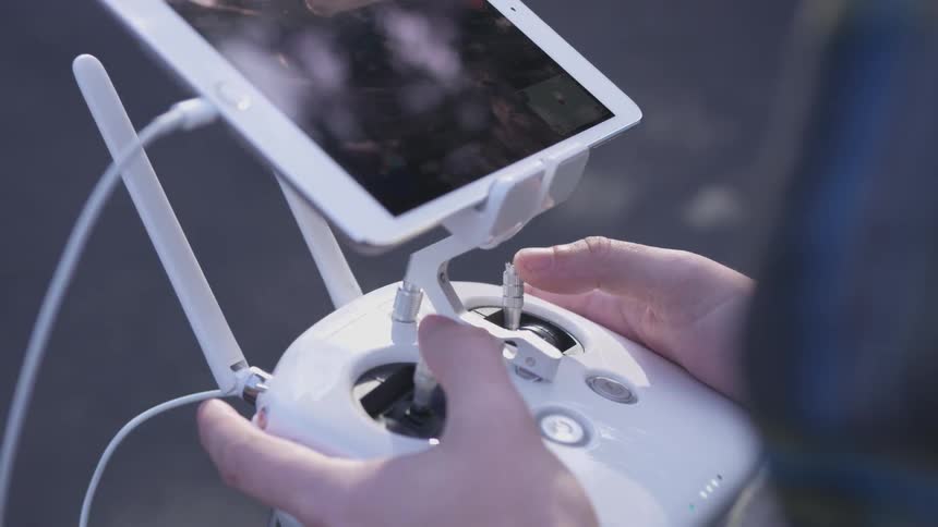 A person is holding an electronic device