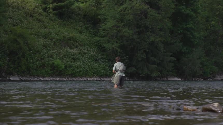 Man Fishing In The River