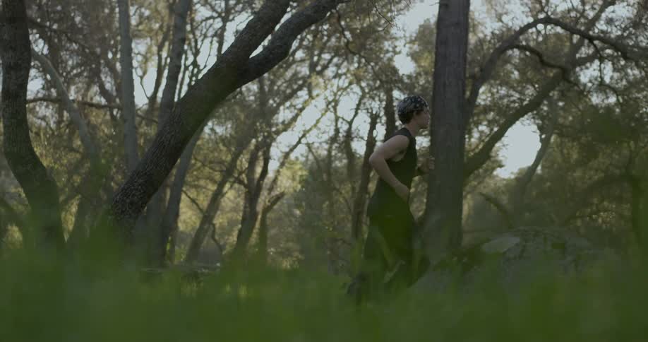 Man jogs in a park during the morning