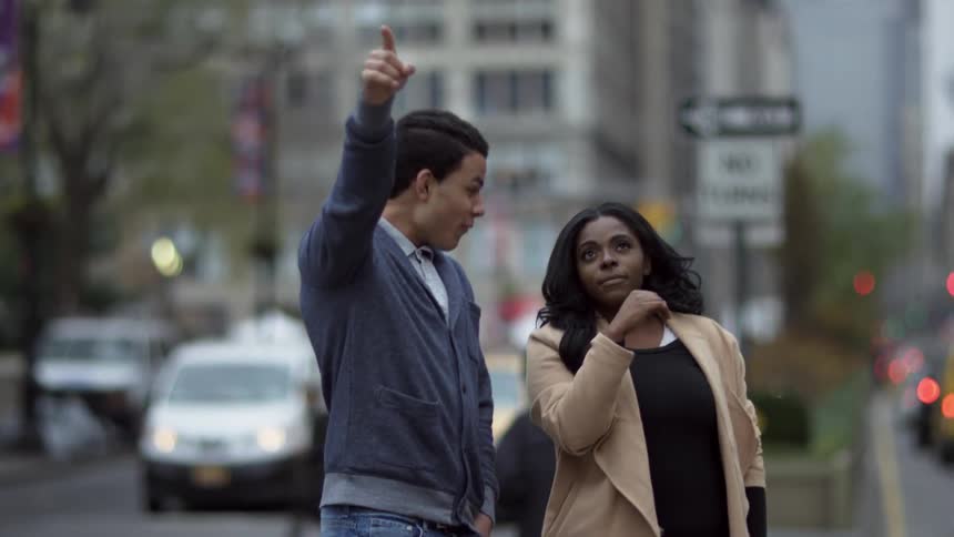 People pointing at something