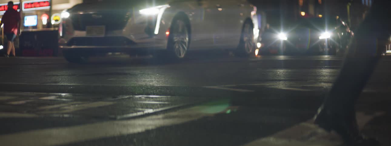 Cars driving through intersection