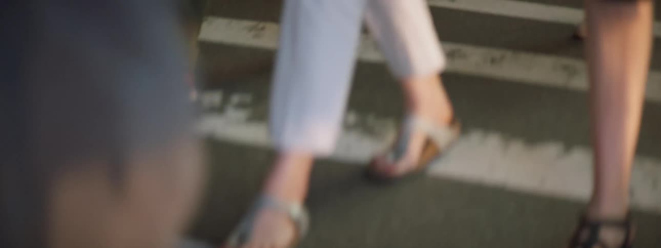 People walking across cross walk