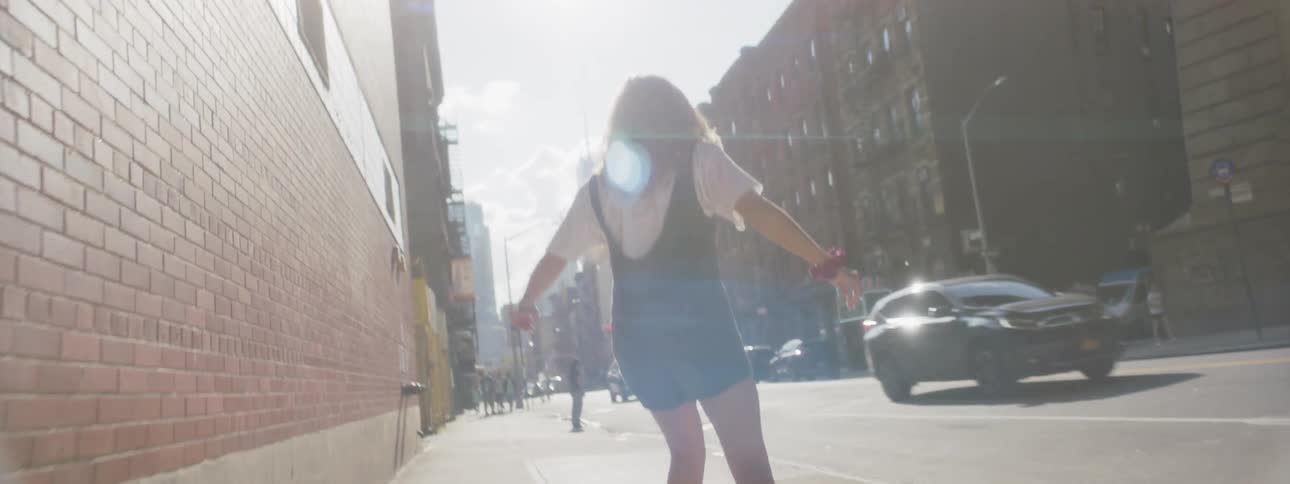 Woman Skateboarding In New York