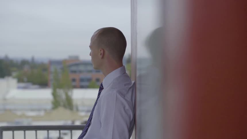 Man On Top Of A Parking Garage