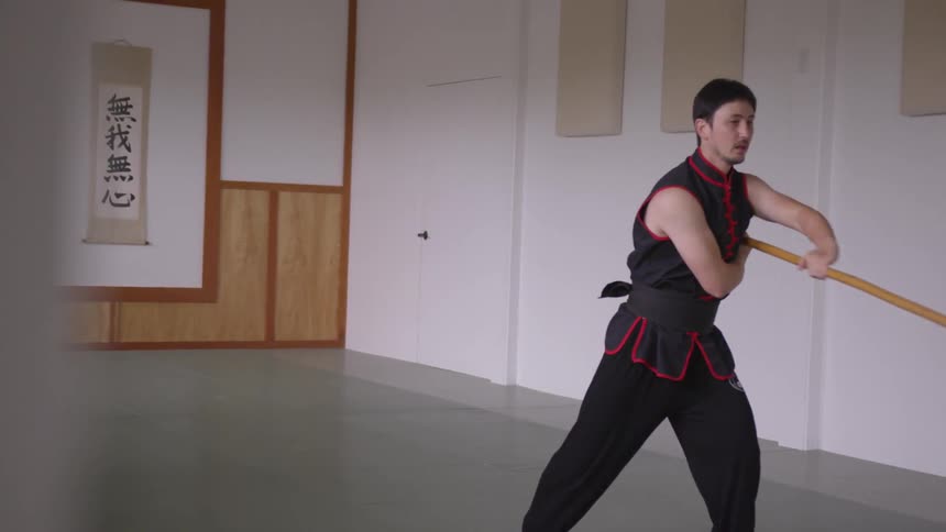 Man Practicing Asian Fighting Techniques