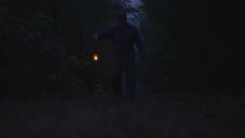 Man Reading Bible In Forest