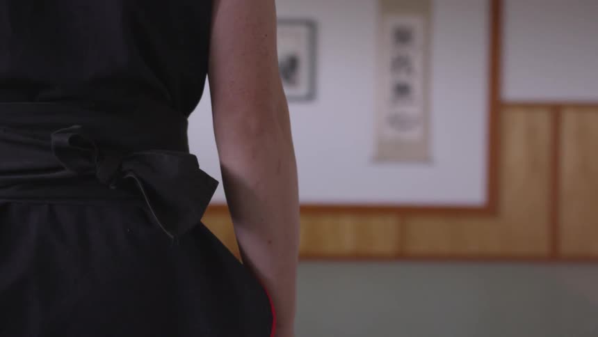 Man Practicing Asian Fighting Techniques