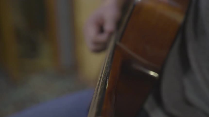 Man Playing Guitar