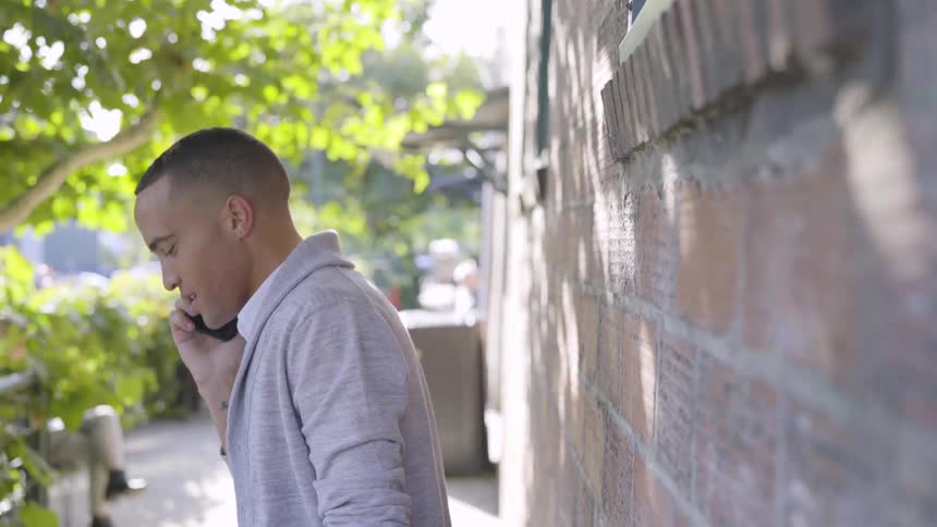 Man Praying And Talking On The Phone