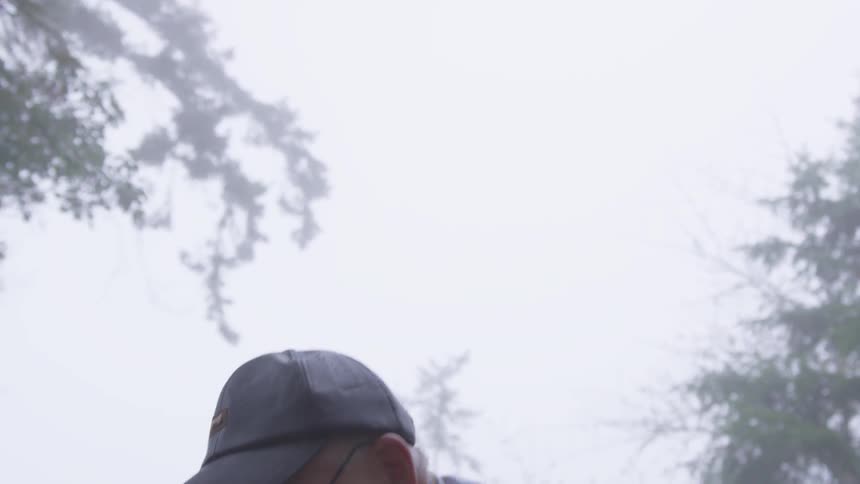Man In Forest With Weapons