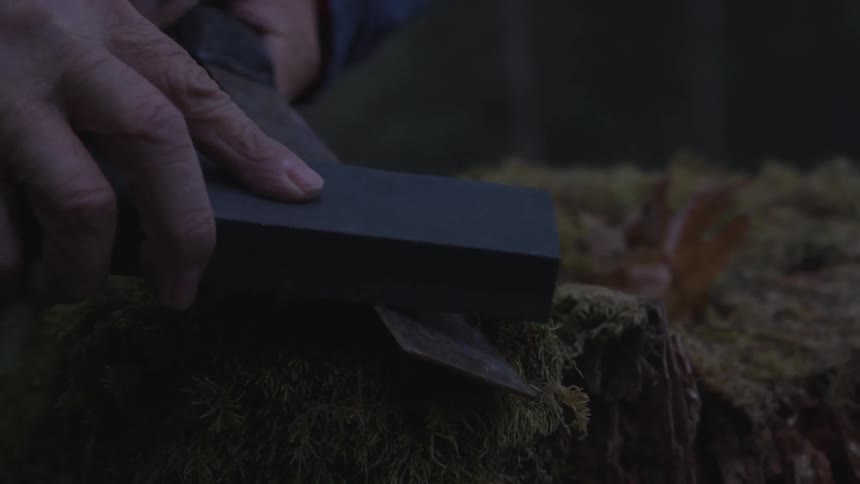 Man In Forest With Weapons