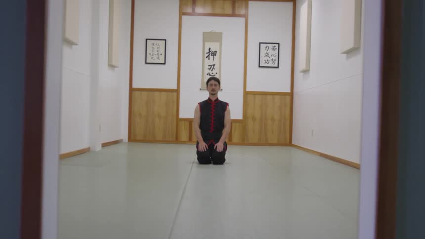Man Practicing Asian Fighting Techniques