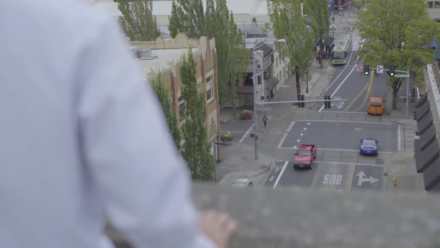 Man On Top Of A Parking Garage