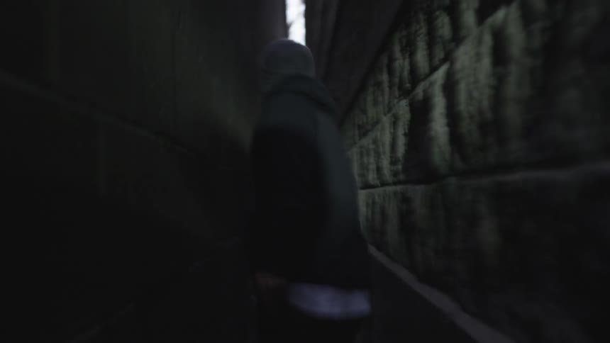 Man Running In Alley