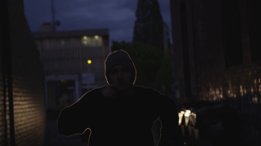 Man Running In Alley