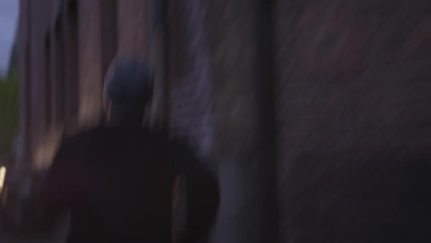 Man Running In Alley