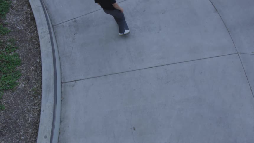 Man Skateboarding In The City