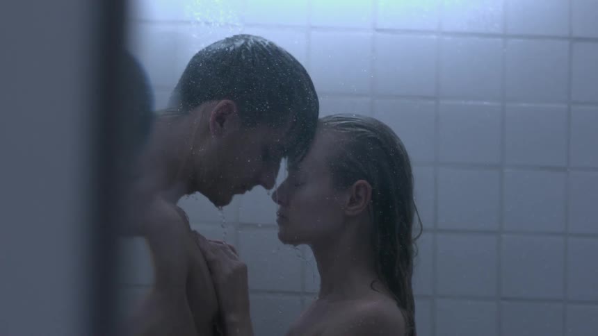 Couple comforting each other while in the shower