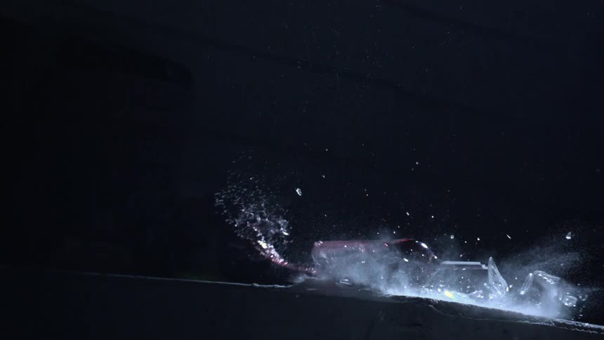A glass of wine falling and shattering