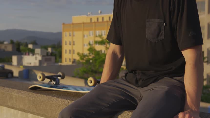 Man Skateboarding In The City