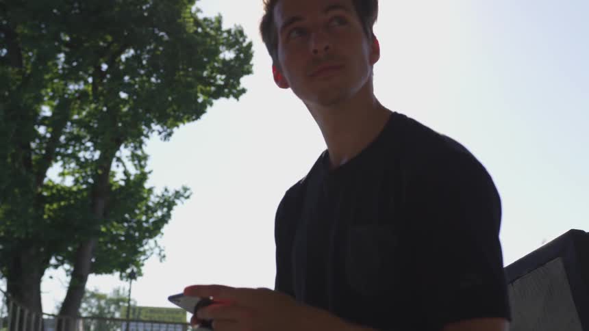 Man Skateboarding In The City