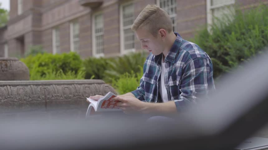 Man Studying On Campus