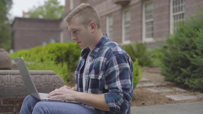 Man Studying On Campus