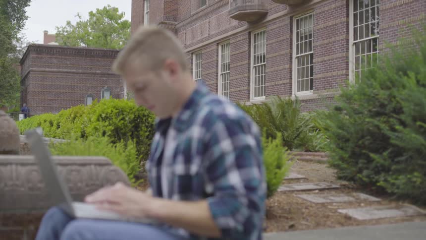 Man Studying On Campus