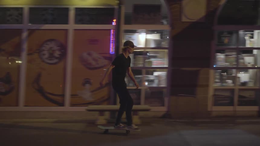 Man Skateboarding At Night