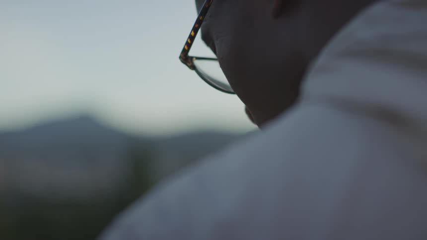 Man Walking And Reading Bible