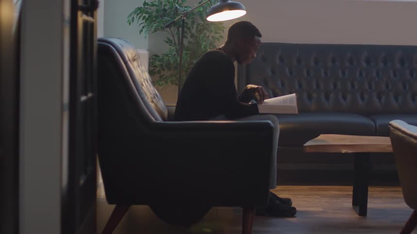 Man Walking And Reading Bible