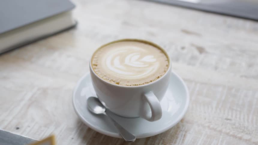 Man Working At Coffee Shop
