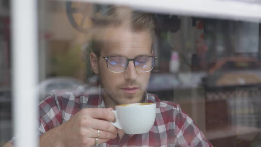 Man Working At Coffee Shop