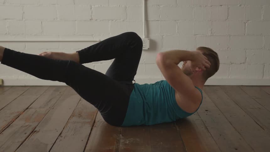 Man Working Out In Empty Room