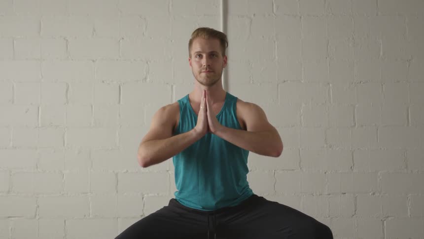 Man Working Out In Empty Room