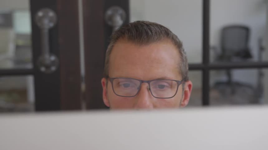 Man Working In Office By Himself