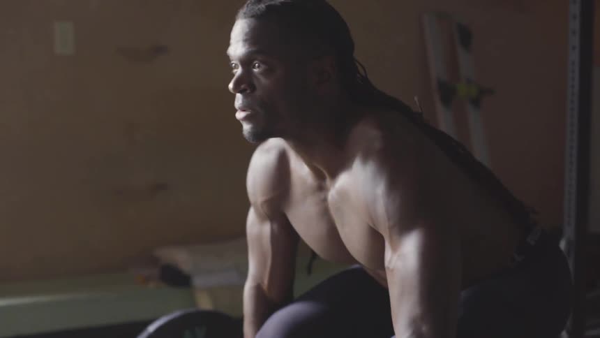 Man Working Out In Gym