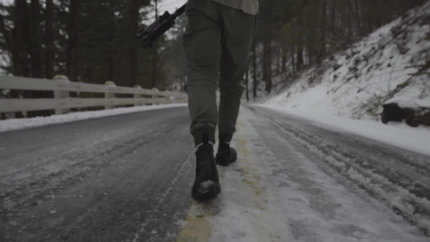 Man Taking Photos In Winter