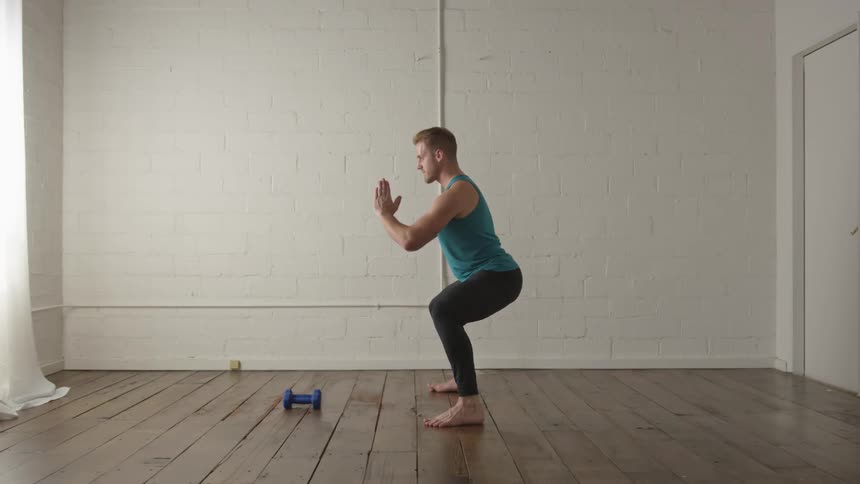 Man Working Out In Empty Room
