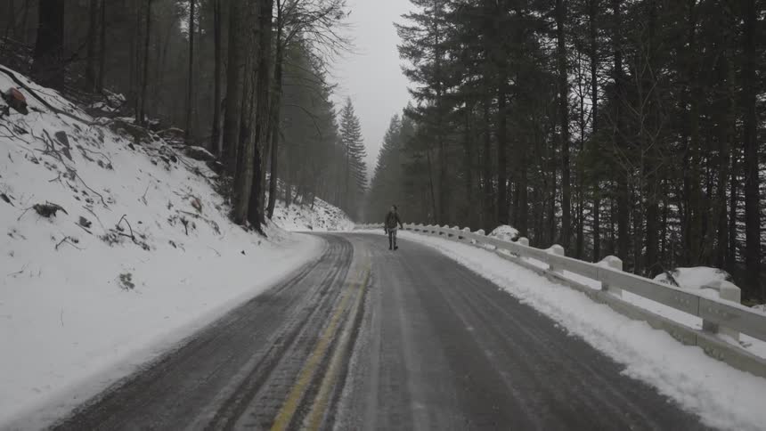 Man Taking Photos In Winter